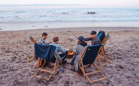 Friends enjoying their time on Tynemouth Beach